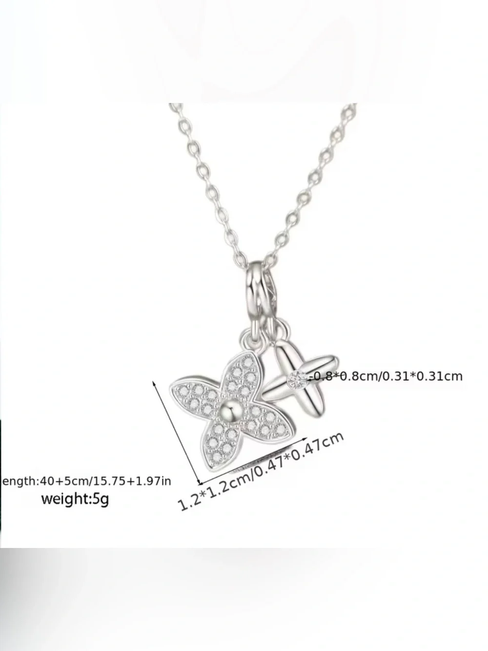 New silvery necklaces with pavé-set CZ stones a four-leaf clover pendant